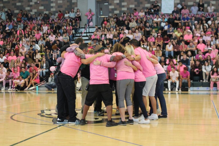 The Detention Room leads a group cheer during the Oct. 13 pep rally.