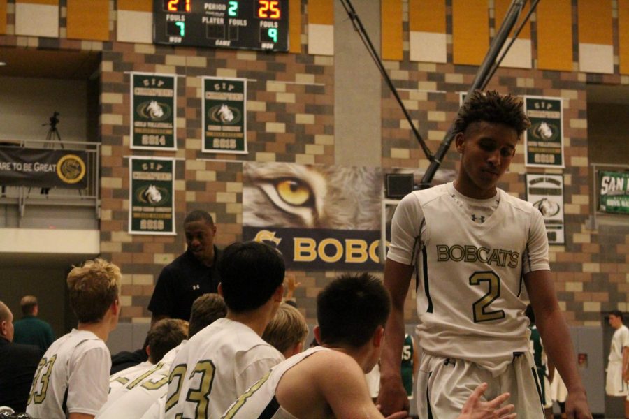 Junior Jayden Blank comes off the court after losing the ball to Mission Vista on Monday. The game went back and forth but the bobcats came out on top.
