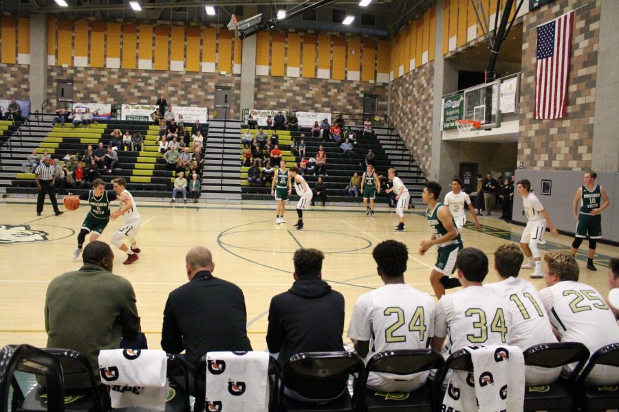 The boys varsity has a team huddle to reassess their position in the game against Mission Vista. The hard work and well executed plays pay off and the bobcats take home the win at their first game of the season. 
