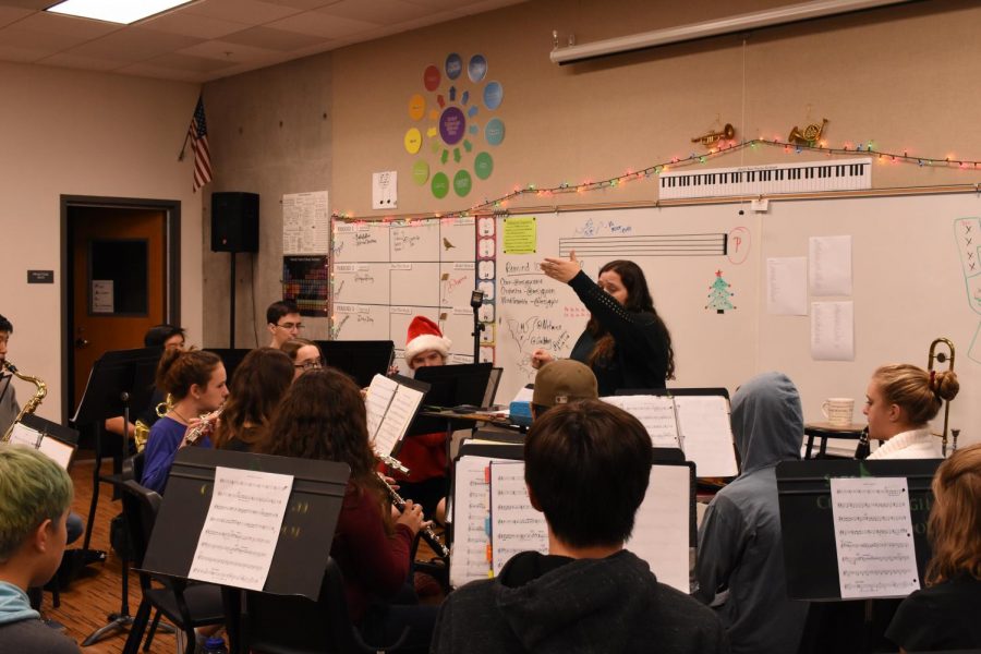 Quinones instructs the band students on their music piece for the upcoming winter concert. 
