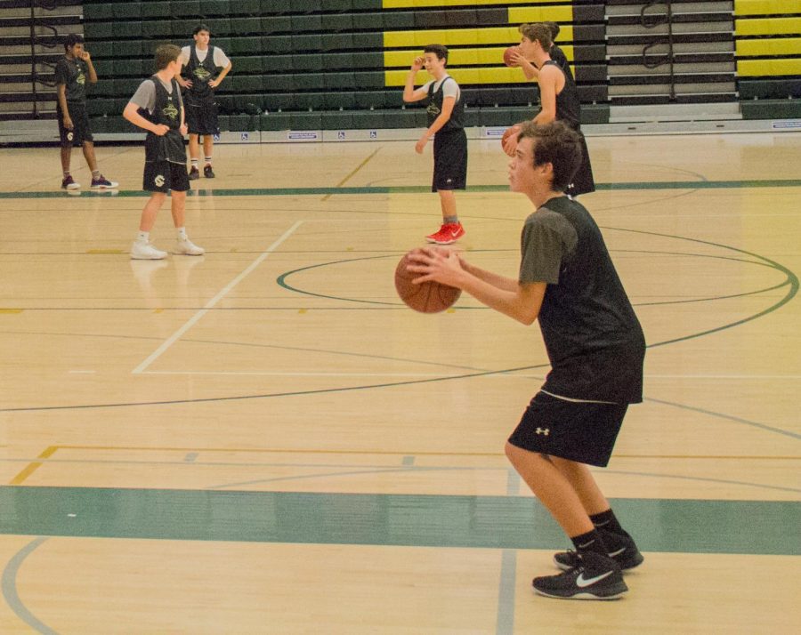 Freshman Gabe Arthur makes a free throw attempt during practice.