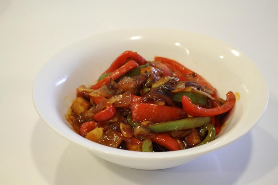 Fried tofu cooked with onion, peppers, sweet & sour sauce, and garlic.