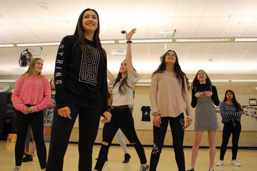 Dance team members practice a routine at one of their daily after school
practices. The team performs often at Sage Creek school assemblies and at half time
during sports games.