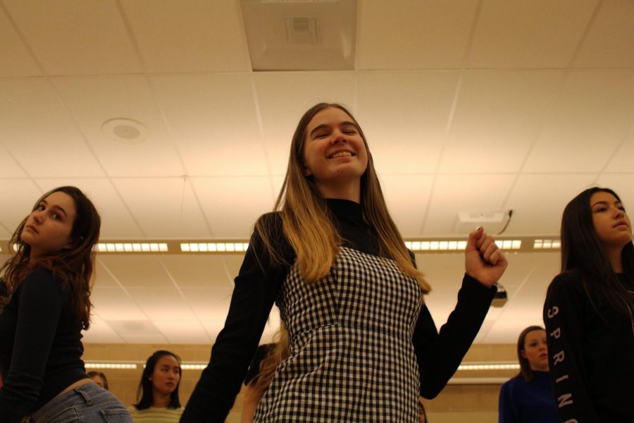 Dance team members practice a routine at one of their daily after school
practices. The team performs often at Sage Creek school assemblies and at half time
during sports games.