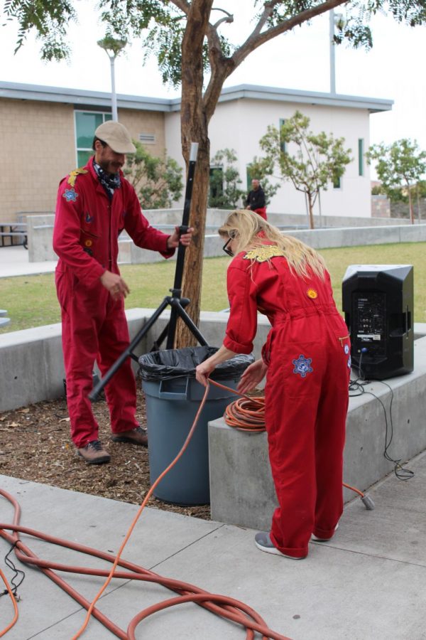 Dr. Bronner's employees are pictured preparing for the soon-to-be event of the season.