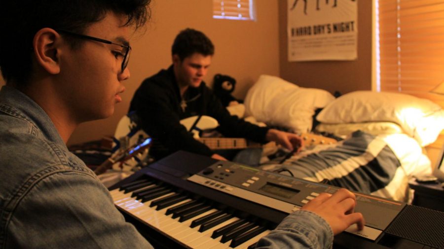 Florentino navigates through the different voices and effects on his keyboard to find the right sound.