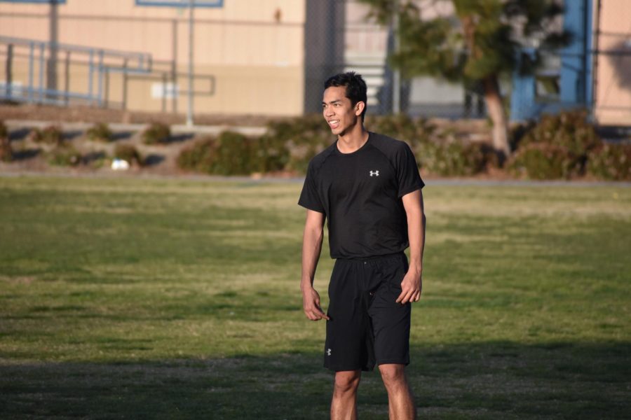 One recruit smiles through his workout.