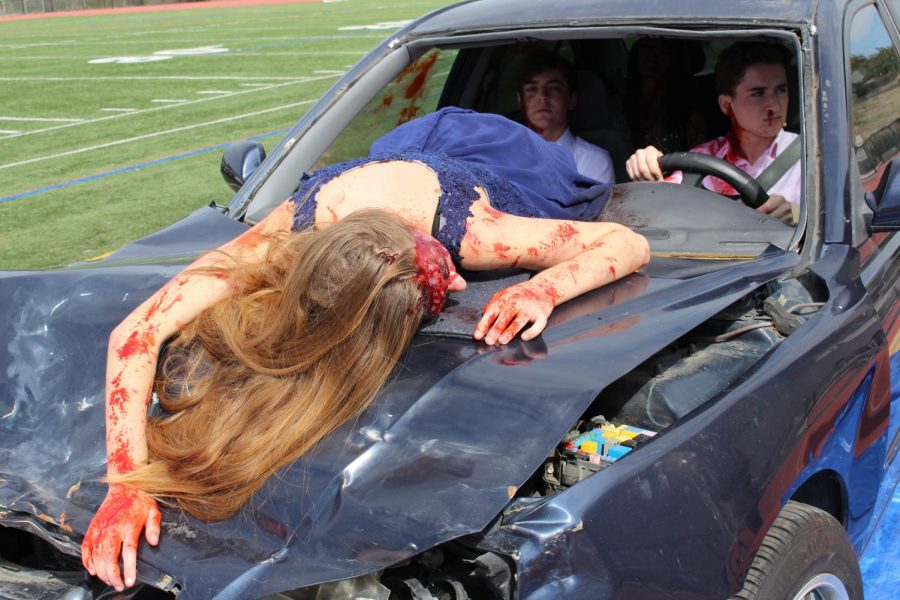 During the Every 15 Minutes two-day program, Junior Summer Fitzgerald unfortunately passed away in the simulation, and is displayed laying on the hood of the totalled vehicle.