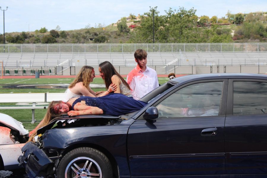 As seniors Lea Marquez and Jonathan Schlegel stumble out of the vehicle, they too join Paige Loeffler in grieving for what has happened in the scene.