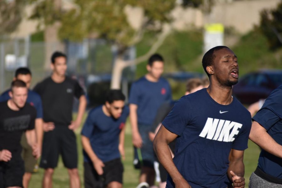 Recruits warm up before they start their training.