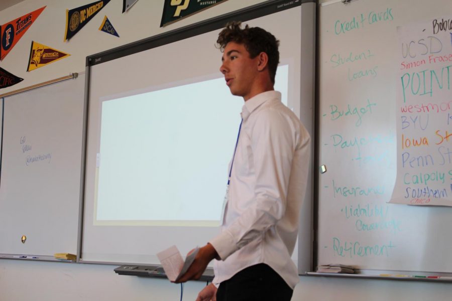 Junior Garrett Taylor pitches his Genius Project, in which revolves around developing video games that help students do better on history tests.