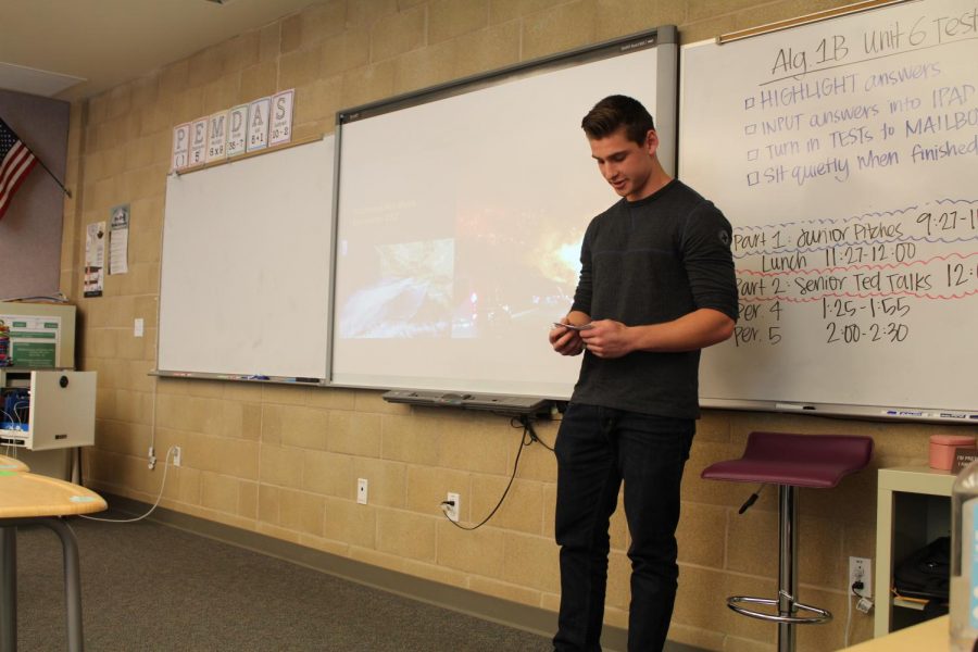 Junior Steele Dargie presents his Genius Project to the audience of seniors and teachers. On April 26, juniors and seniors presented their projects to each other, providing constructive criticism and advice on each other's progress and project outcome.