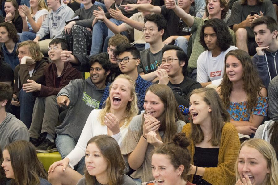 The student body cheers on and laughs at their fellow classmates as they participate in the last class cup competition of the year.