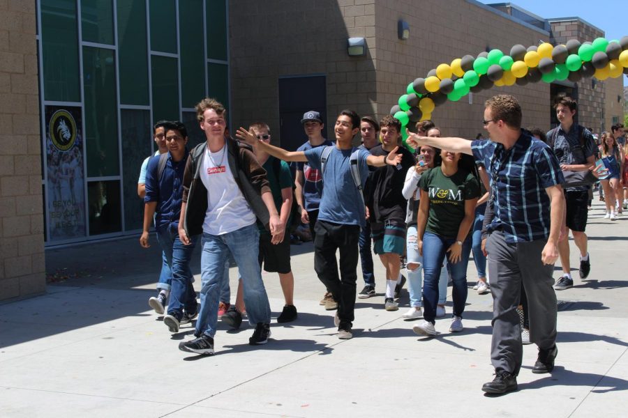 Señor Krámar’s advisory class begins their stride throughout the campus during the senior walk-off.