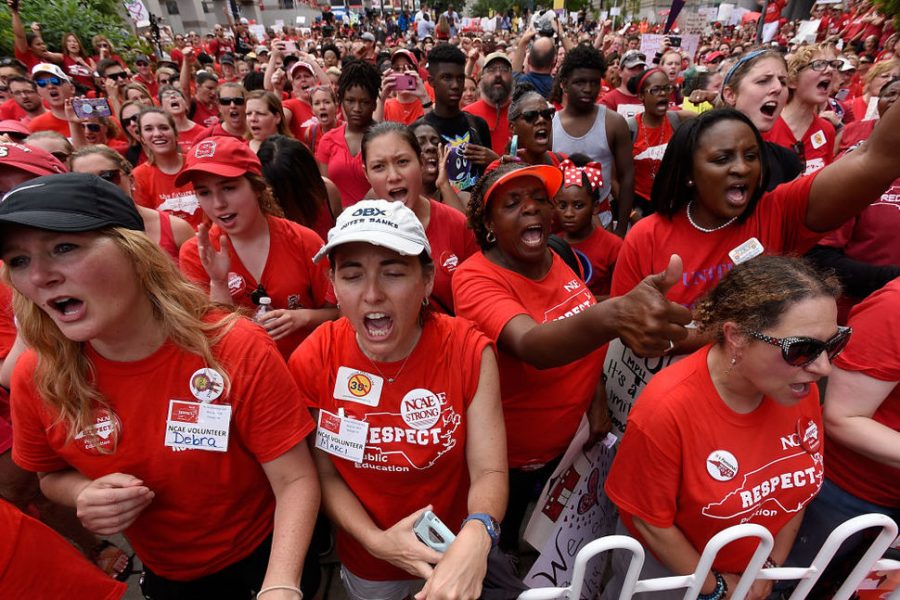 Teachers in North Carolina marched at their capital Raleigh on Wednesday, May 16th wearing matching red shirts and carrying posters. North Carolina teachers joined many other states in marching for fair wages, benefits, and better education funding.