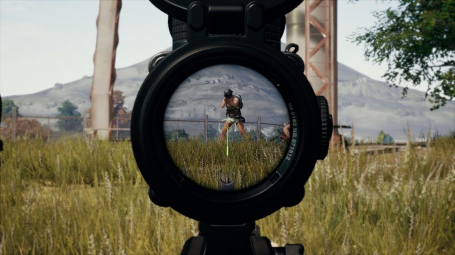 A player looks through the scope of a rifle, preparing to line up her shot. Among the various weapon attachments that can be found in Playerunknown’s Battlegrounds are magnified optics of different magnifications.