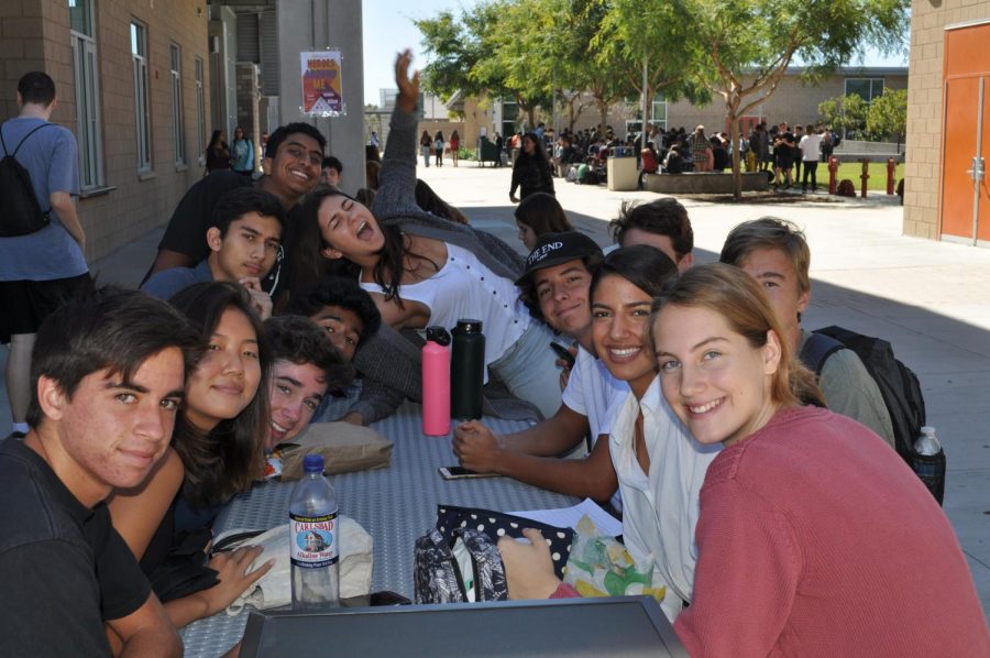 Seniors enjoying their 30 minute break to hangout and mess around during lunch. Stationed right in front of Friday’s music station in the Academic Mall, Justin Morris, Bonnie Brasher and their collective friends never fail in making the most of their high school memories.