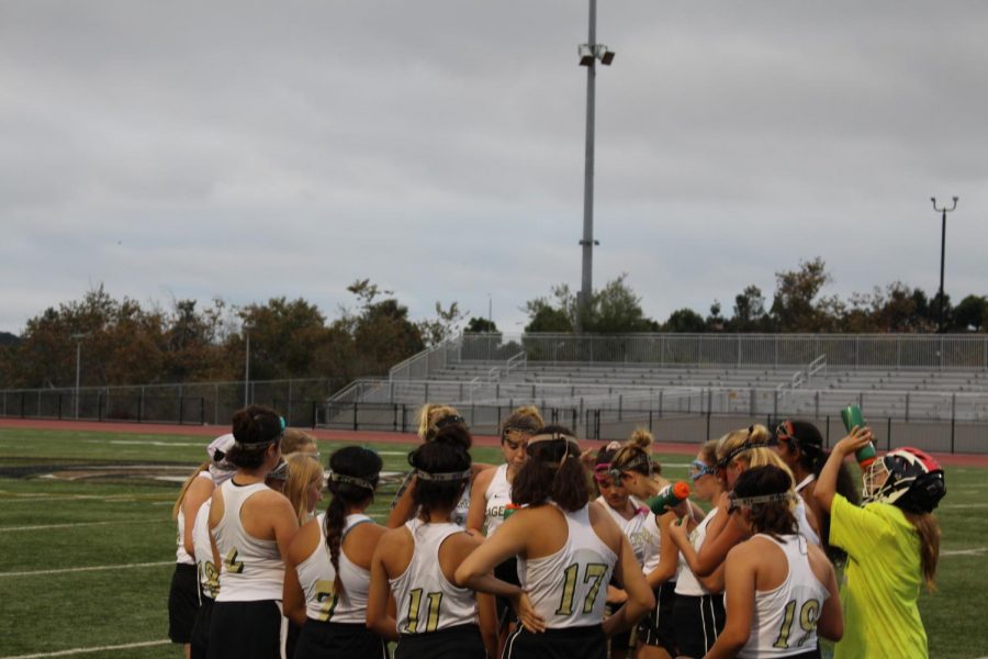 The field hockey girls huddling during half time to discuss strategies for the rest of the game. The field hockey team took on both Escondido High School on Wednesday, Sept. 26 and La Jolla Country Day on Friday, Sept. 28.