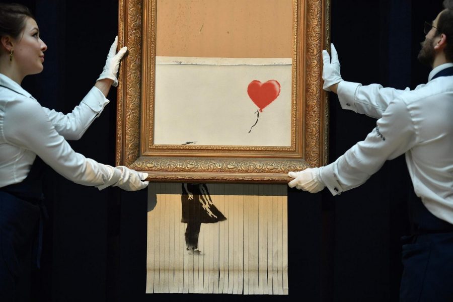 Banksy shredded his artwork, making the piece worth more than it was ever originally.The girl’s face cannot be seen but the red balloon still taunts her. 