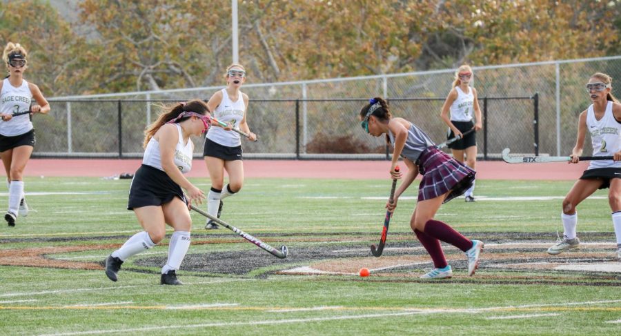 Junior Lyla Killon aggressively plays against an opponent  from Ranch Buena Vista in a tough game of Feild Hockey. During the game, both teams gave all they had, with Rancho Buna Vista taking the win in the end.