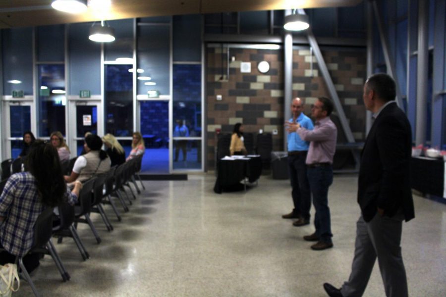 Principal Morales listens to a question from one of the attendants of the meeting. After the meeting, Mr. Morales spoke to Superintendent Churchill about the future of theCarlsbad Unified School District. 