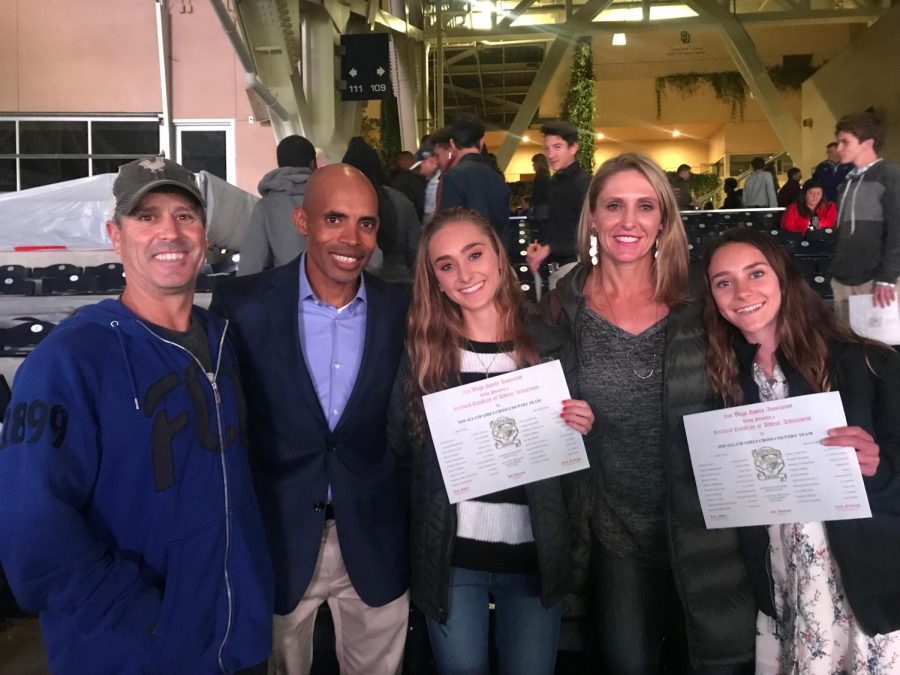 Junior Skyler Wallace and freshman Stormy Wallace meet Olympic runner Meb Keflezighi. The girls attended Petco Park last Wednesday to receive the award of All CIF for the 2018 Cross Country season.