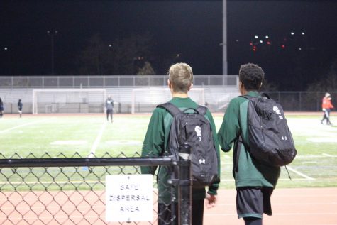 Titus Washington and Jet Trask walk onto the field ready to secure the win against the opposing team. Their next game is Tuesday, Jan. 15 at Oceanside high school.