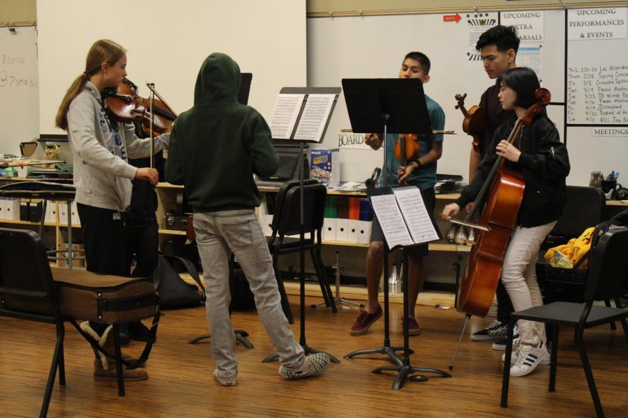 Orchestra rehearses for their upcoming concert. The performance will be on Thursday, Feb. 28 in the Performing Arts Center.