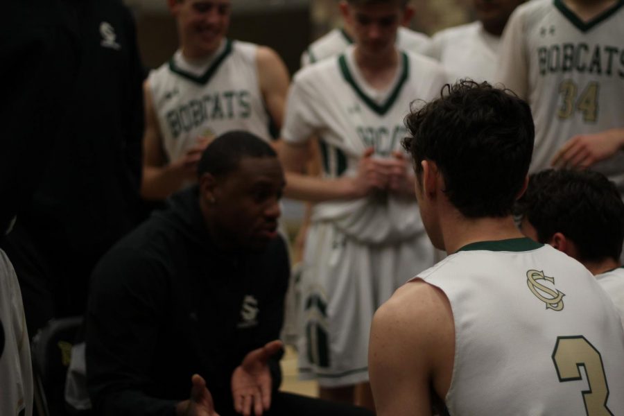 Head coach Brandon Dowdy is telling the game plan for the next quarter. The Bobcats took a huge scoring drive prior to the time out. 