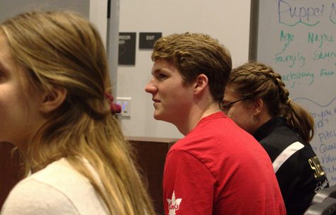 Villeneuve listens to Mrs.Porter-Eshelman as she announces what the class will be doing next. This is Villeneuves fourth year in Sage Creek’s theater class.