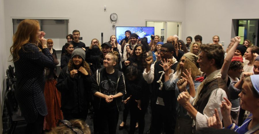 Mrs. Porter-Eshleman gathers the cast and crew before the opening night show to do sixteen consecutive claps all together as a way to get focused and engaged. Sage Creek theater company has been doing this pre show ritual since the first production.