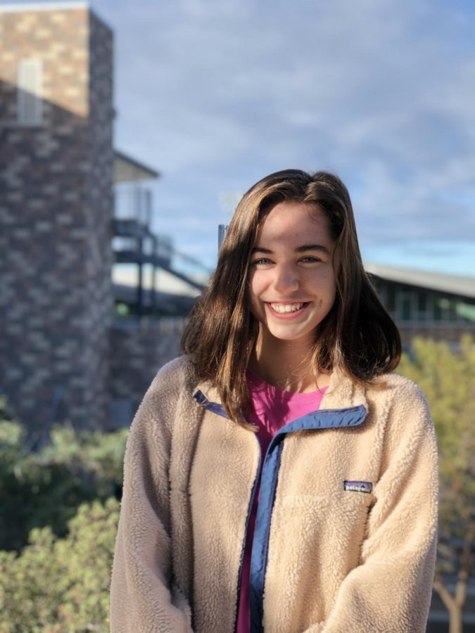 Junior Emma Paul smiles at the camera. She is looking forward to getting started on her Genius Project this year.