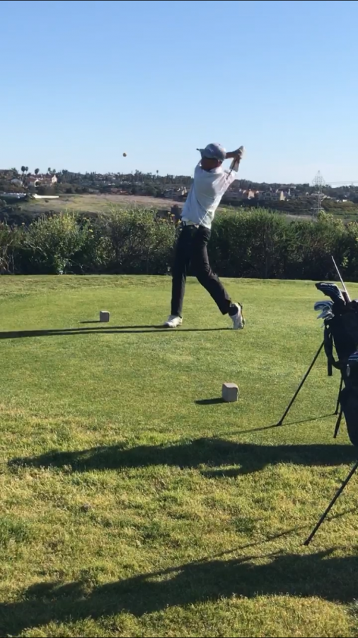 Sophomore David Yoon holds his finish after striping a drive down the middle of the fairway during his home match vs. Vista on Tuesday. The boys golf team has started off strong and hopes to carry this momentum into CIF finals.