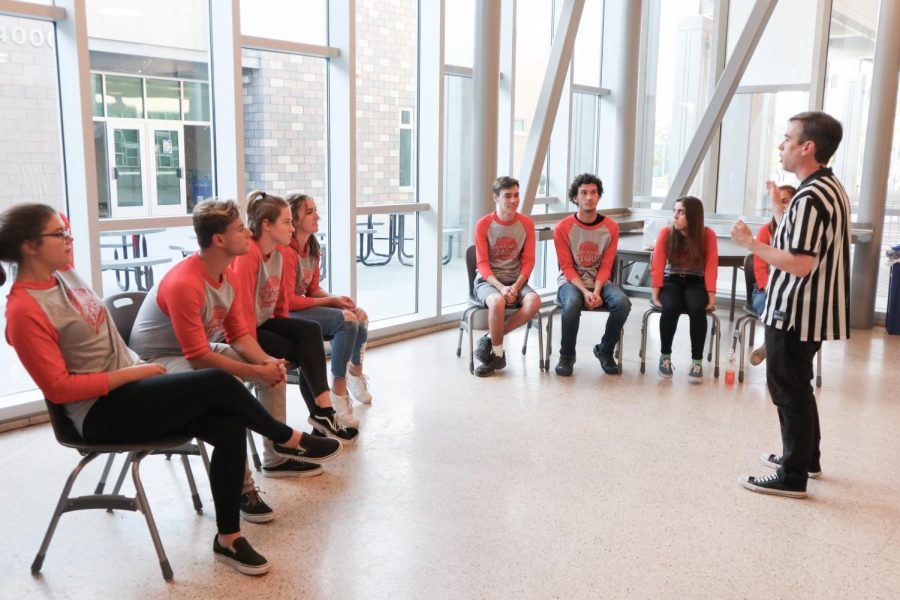  Members of Comedy Sportz, a competitive improvisational group, sit attentively awaiting instructions from the referee. Senior Allison DelGrande created the group to share and expand her love for theatre and acting to all members of the Sage Creek community.