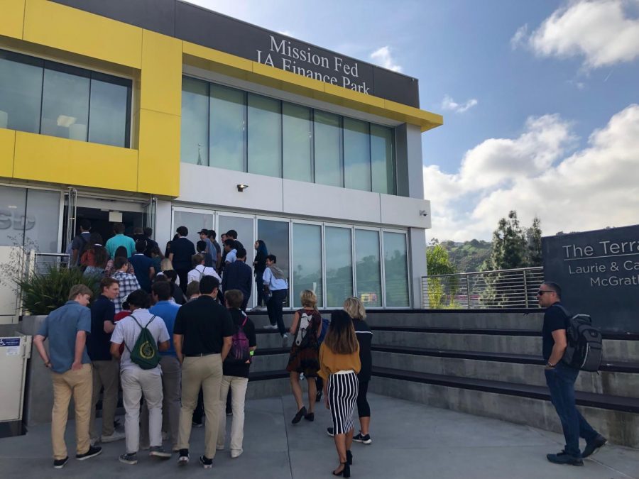 AP Economics and ACE students enter the JA Finance Park building at the conclusion of their personal finance unit on April 9. The students made their way down to San Diego for this CEF funded field trip were they learned about what it is like to build and maintain a budget with different family circumstances including being a single parent and having kids.