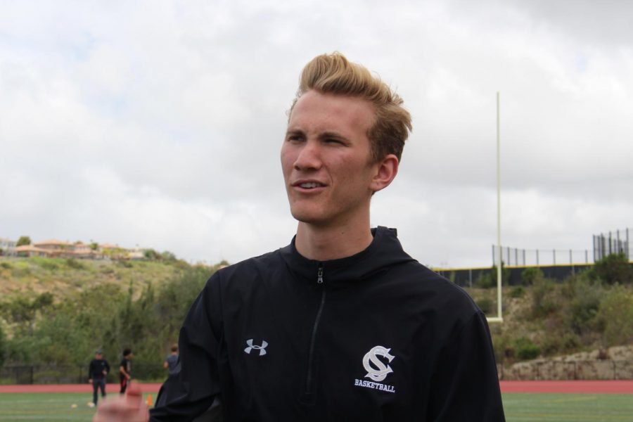 Senior Nick Sonck stands out by the flag football games. Sonck was both a referee and a player on a team.