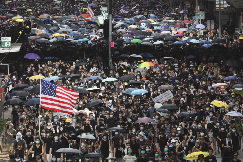 The symbol of freedom and democracy waves in the streets of Hong Kong as the protests rage on. 