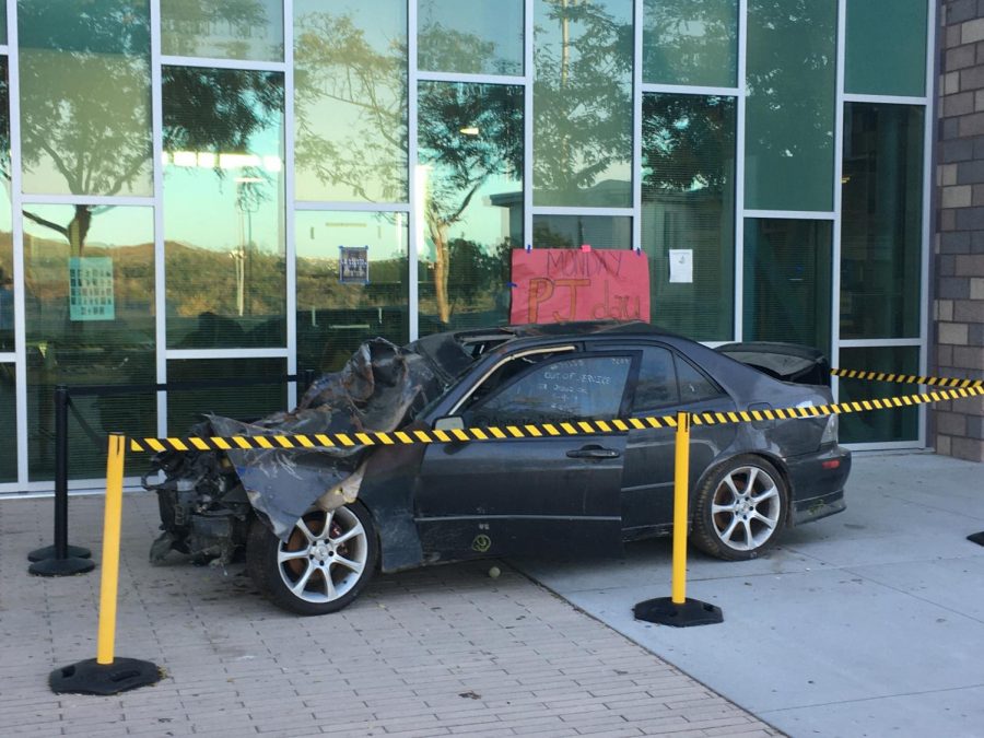 A wrecked car sat in front of the library this week as a reminder of the dangers of drunk driving. 