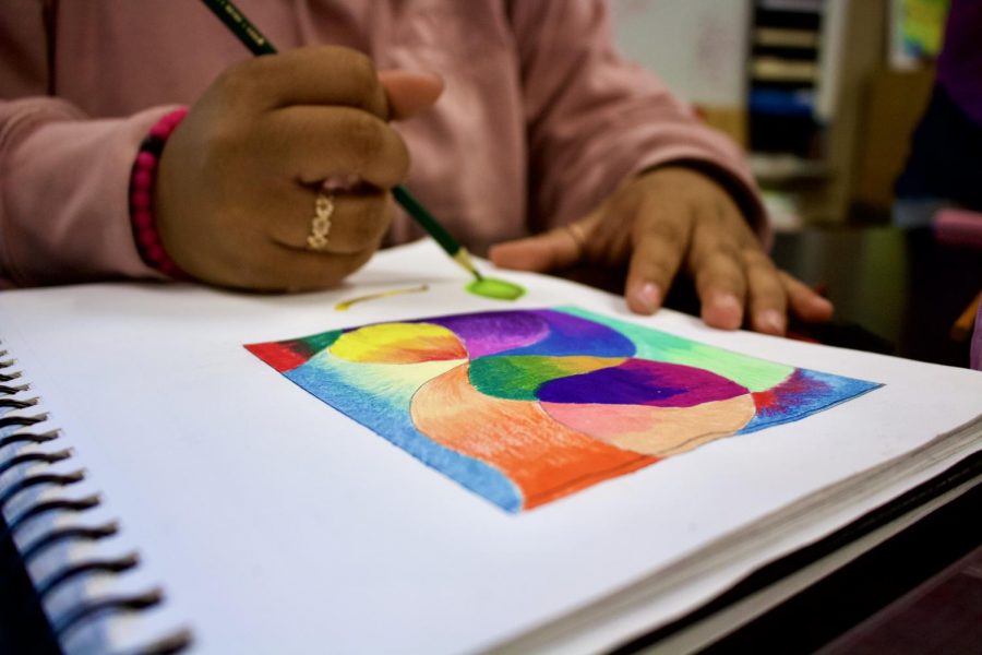 First year art students indulging in a whirlwind of color. The art students are working on their shading techniques.