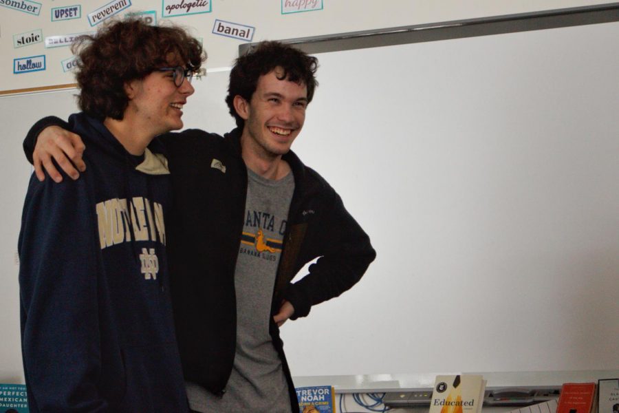 Wiley Waggoner (left) and Ben Hartley crack up while practicing improv for ComedySportz. The game they played forced them to speak in sync while a separate team alternated words.