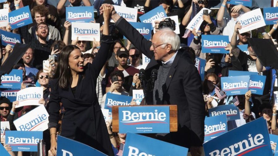 Presidential candidate Bernie Sanders stands with Alexandria Ocasio Cortez House Representative of New York's 14 district at his rally in Iowa. This rally turned out to be extremely successful and in the weeks following he has become the Democratic frontrunner.
