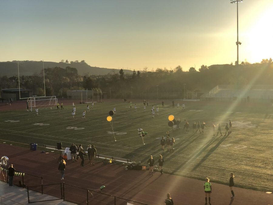 Varsity girls soccer team preparing to celebrate their seniors during the annual senior night. They played and won their last home game Friday, Feb 7.