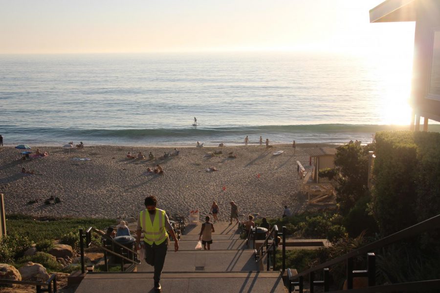  Carlsbad citizens are enjoying the Carlsbad beach as it flourishes in the sunny and bright weather. Everyone was wearing a mask and staying safe while simultaneously having a good time. 