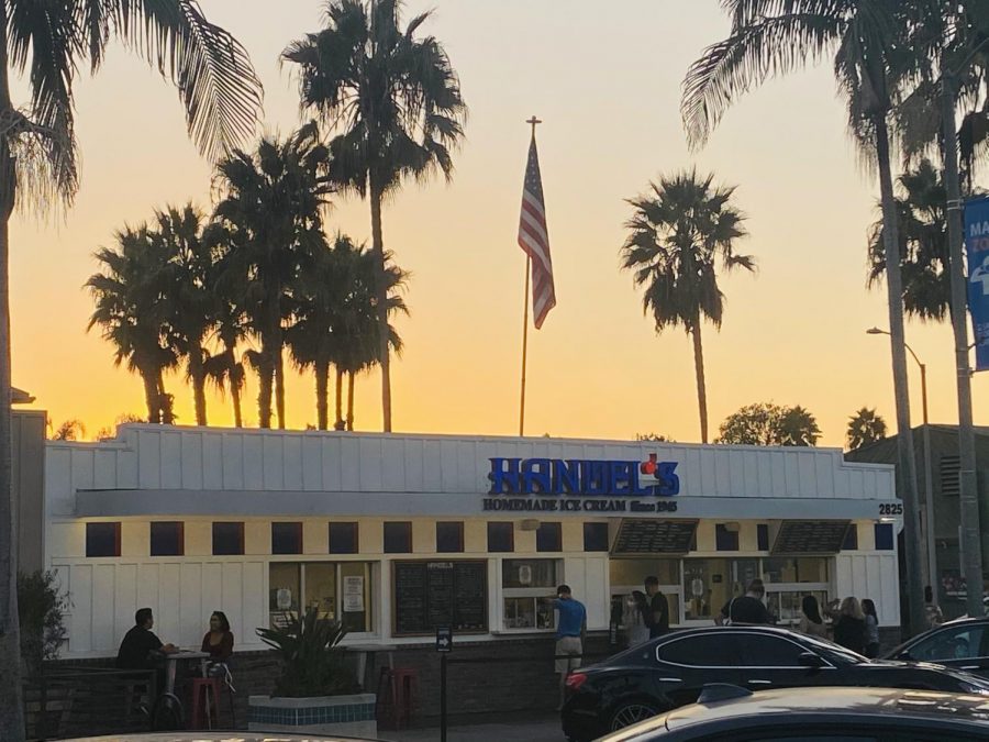 Carlsbad locals safely wear masks while they order ice cream on this hot fall night at “Handel’s Homemade Ice Cream”. One of downtown Carlsbad’s favorite ice cream shops, “Handel’s” first opened back in 1945, and has since brought delicious homemade ice cream to citizens all over the United States. 