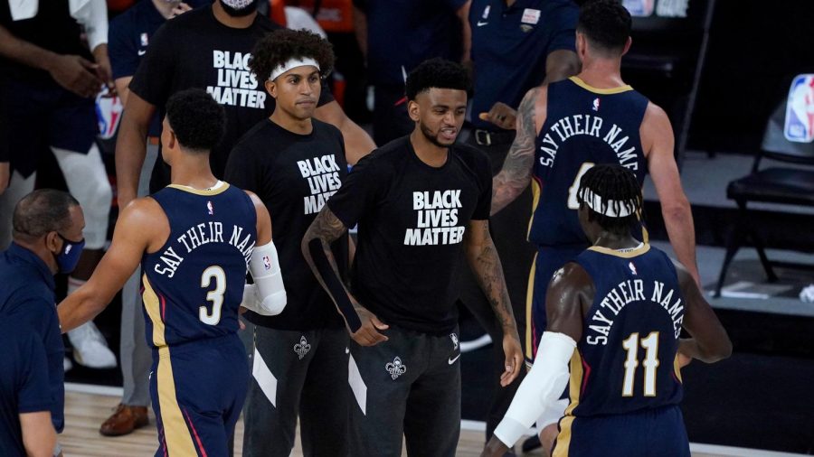 NBA players stand with the Black Lives Matter movement by wearing phrases in place of their names. Most NBA players have opted to wear phrases.