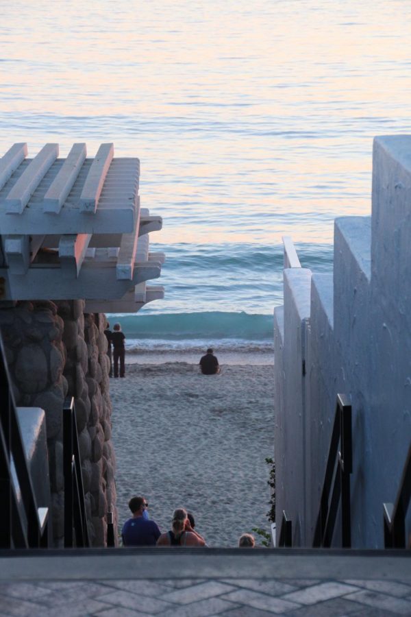 Carlsbad Beach residents enjoy the ocean view before the sun sets. They gazed at the sea before the tide crept up for night.