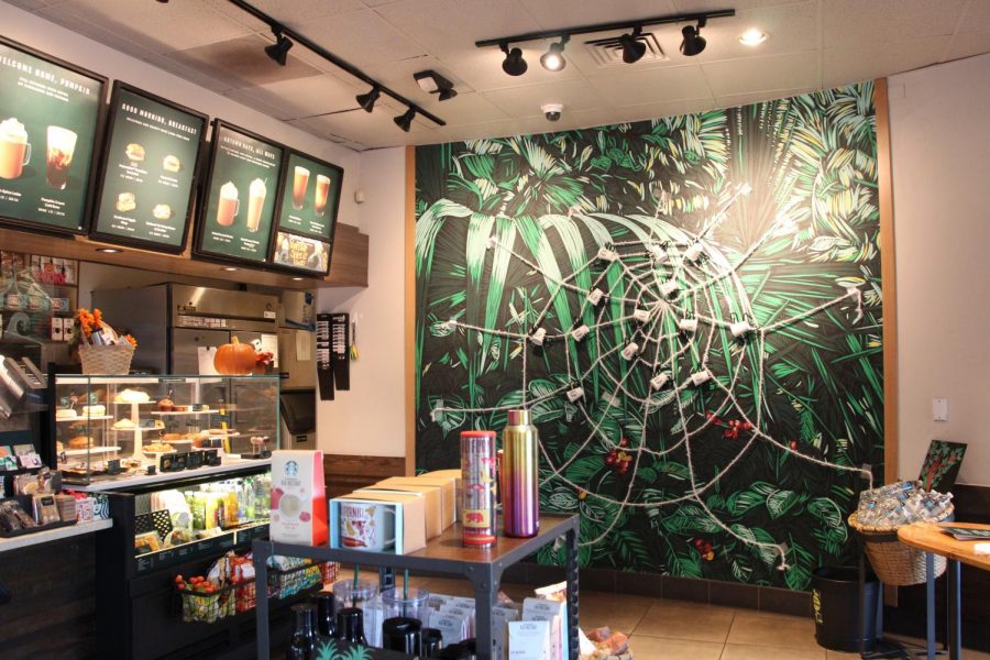 The village Starbucks Coffee Shop is all decked out for Halloween with custom, homemade decorations. Customers enjoyed their drinks as well as the fantastical decorations.