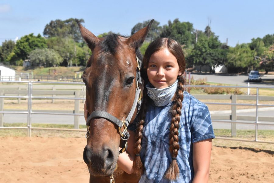 Jade Chen 16 Year Old junior she is a volunteer at Ivey Ranch she is together with a horse and that’s what she does at Ivey Ranch.