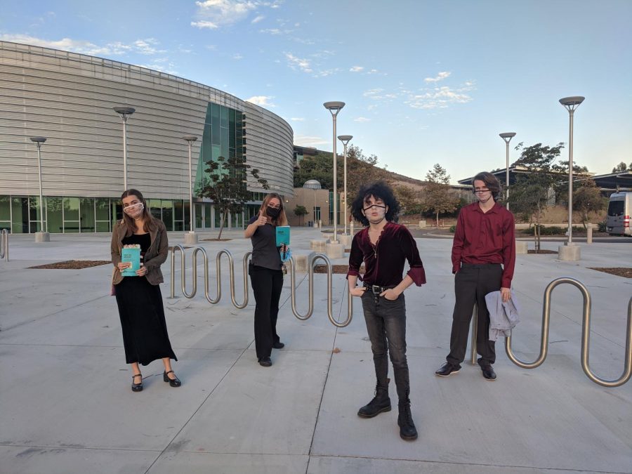 Drama students Emma Linejoy,  Hannah Katz, Luca Stapleton and C.J. Cryan posing after their afternoon theatre practice. They all are masked up and maintaining social distancing. 