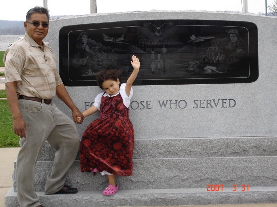 Vasquez poses with granddaughter Isabella Niems. Vasquez lived with Niems for 17 years and raised her as his own child. 
